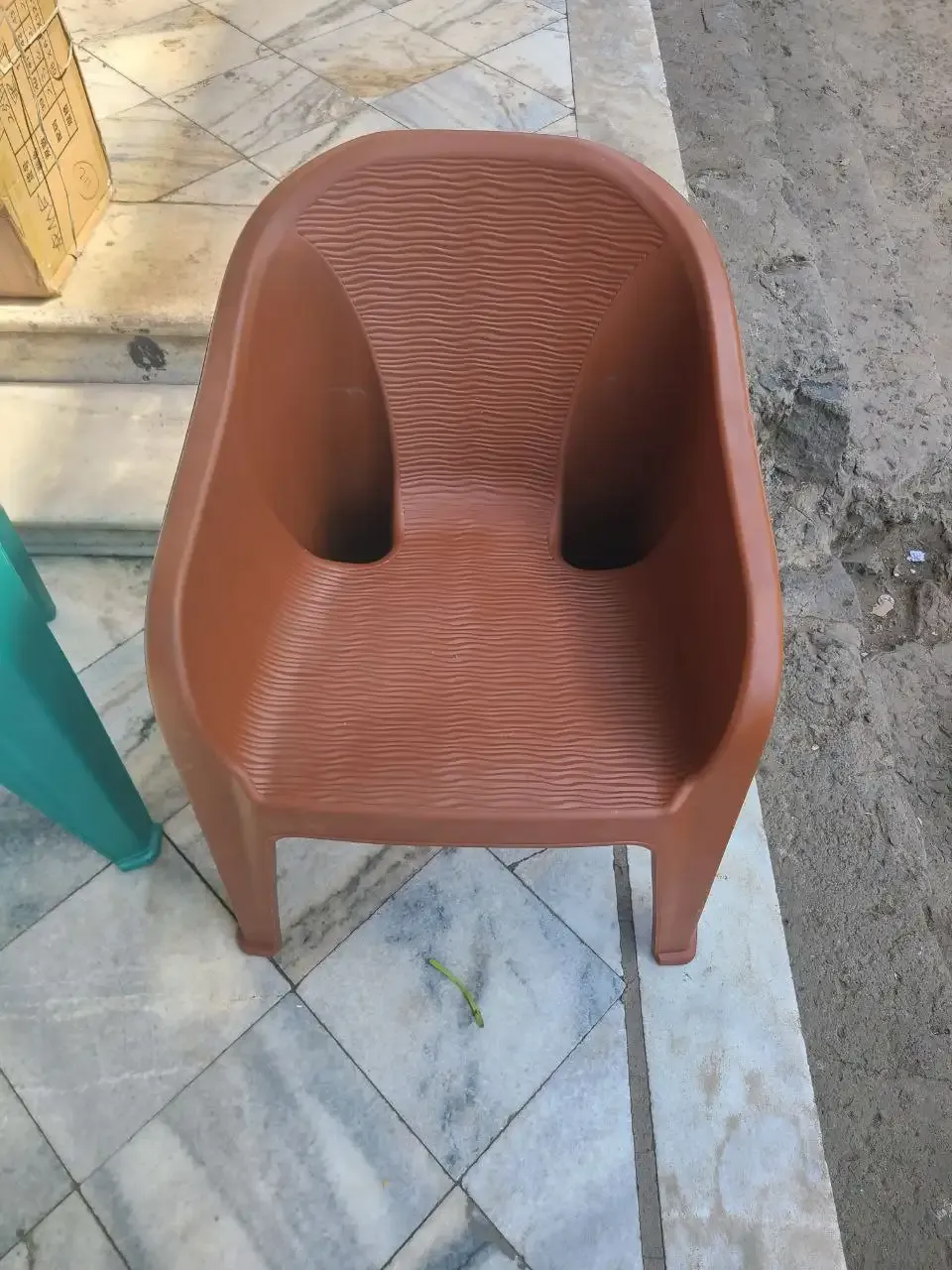 Green-Plastic-Hollow-Chair-3.webp